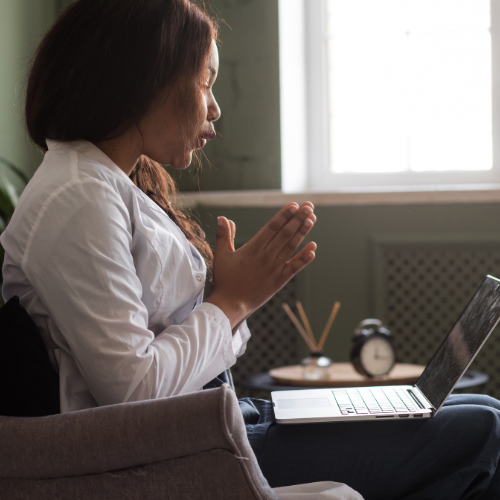A person speaking with a clinician remotely